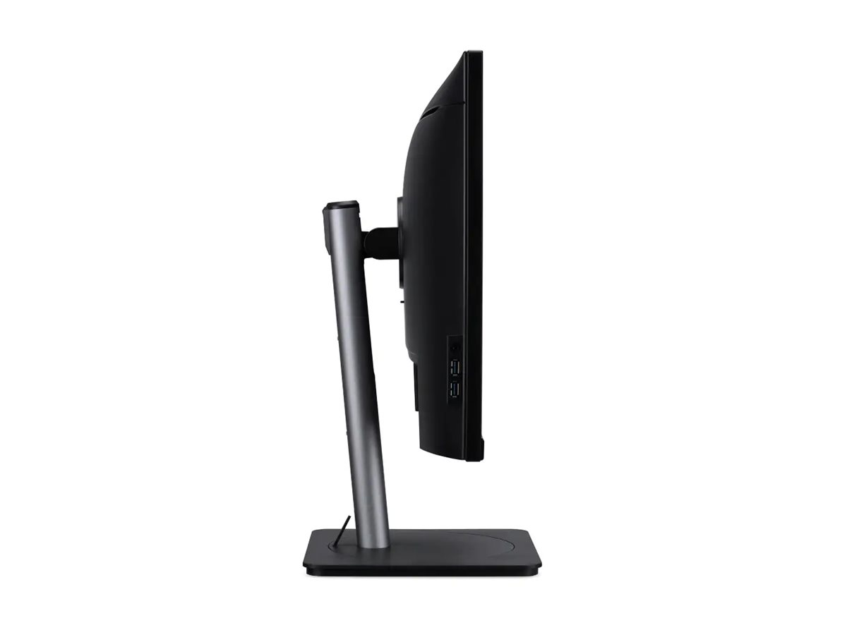 Vista laterale di un monitor di computer nero su supporto grigio su sfondo bianco.
