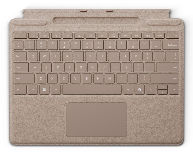 Una cubierta beige para Surface Pro con un teclado QWERTY integrado y un panel táctil sobre fondo blanco.