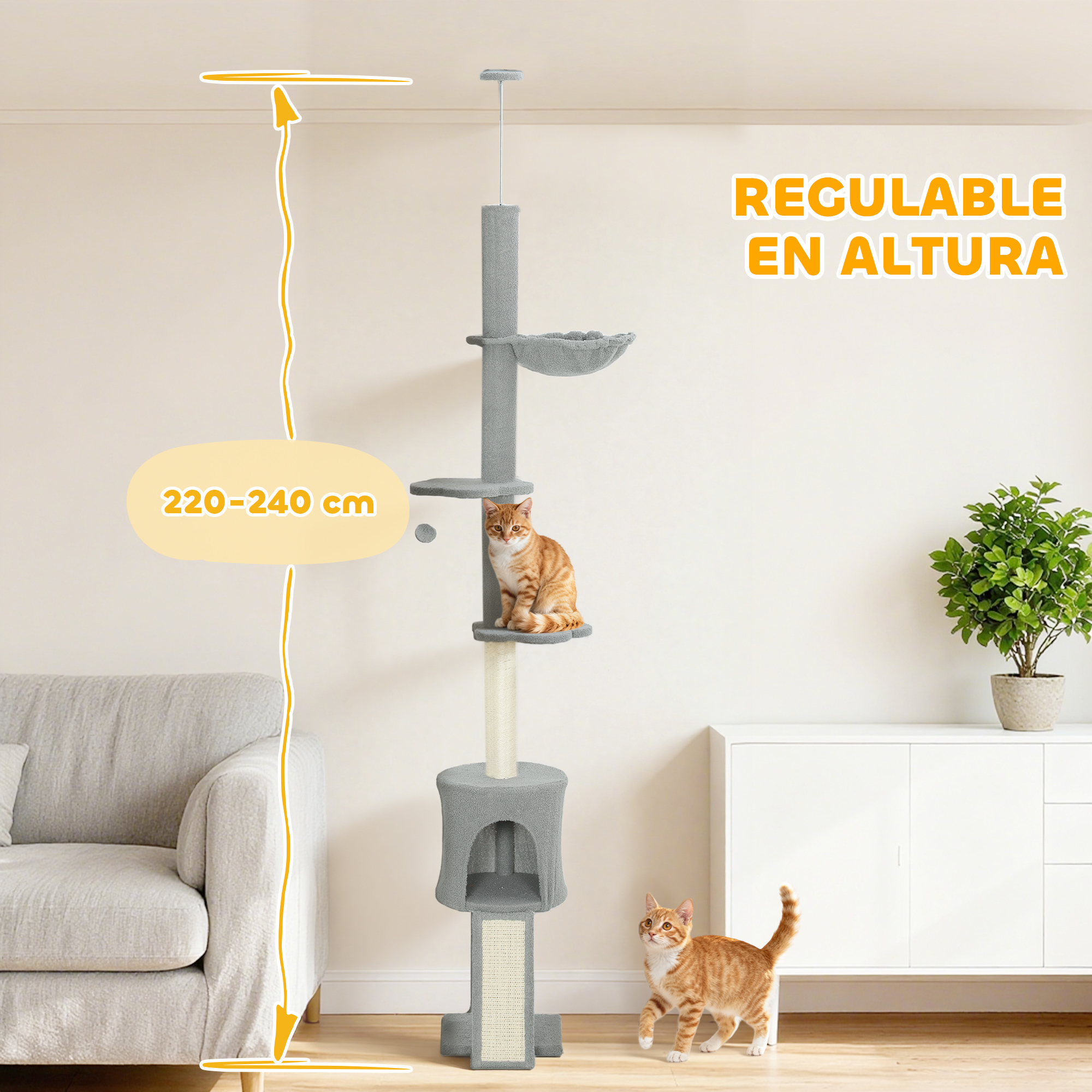 Un rascador alto y gris con dos gatos naranjas, un sofá gris y un mueble blanco en la habitación.