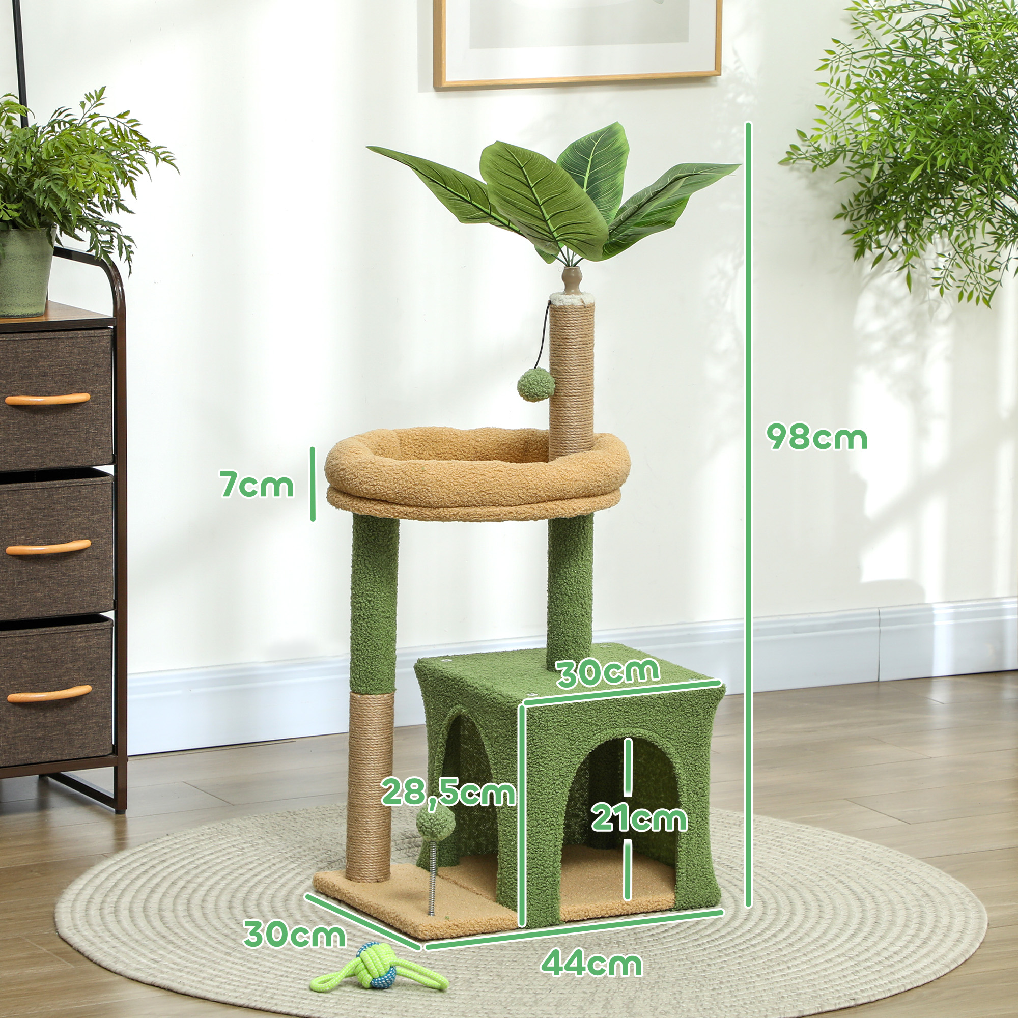 Árbol para gatos verde y marrón con cueva acogedora, plataforma de descanso, pelotas de juguete y hojas artificiales.