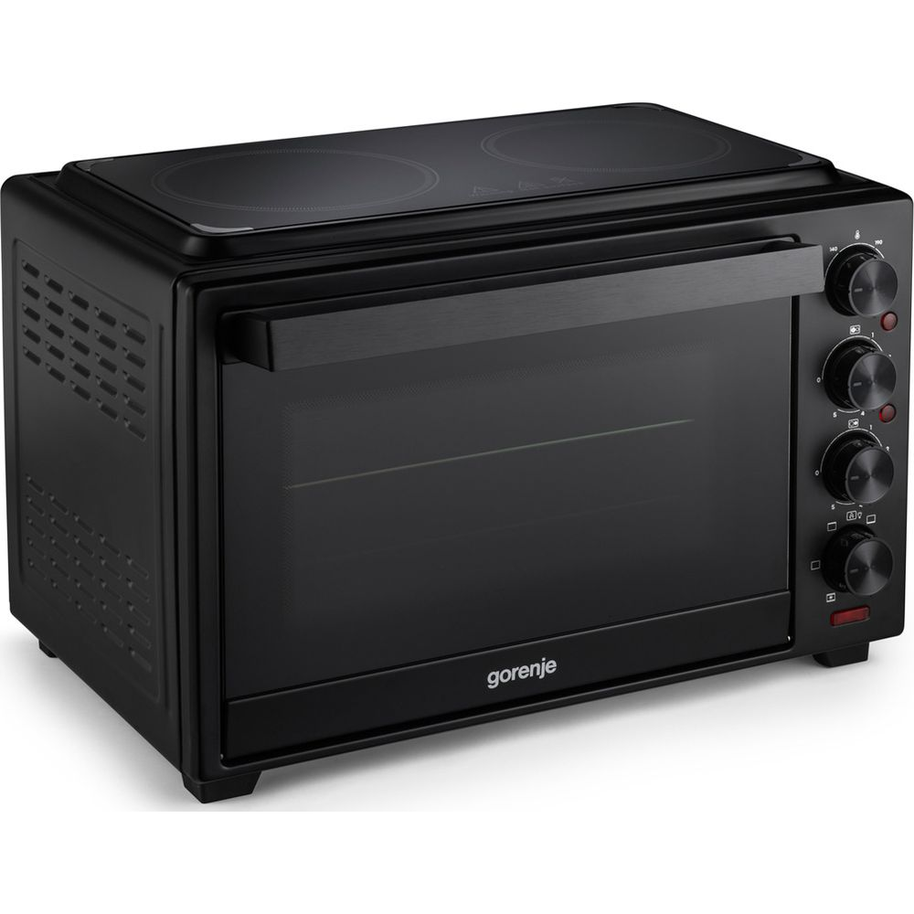 Un mini forno nero Gorenje con piano cottura superiore e manopole a destra.