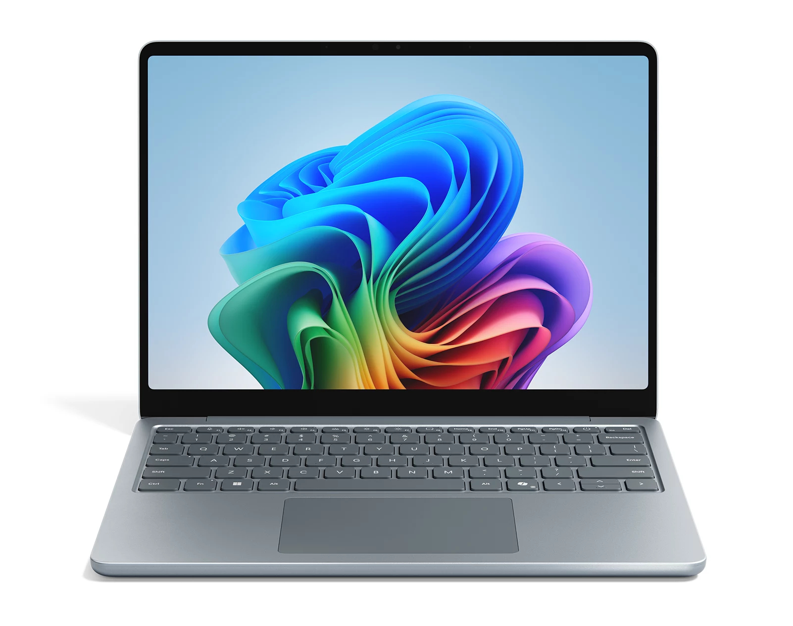 Ein silberner Laptop mit einer bunten, blumenartigen abstrakten Grafik auf dem Bildschirm.