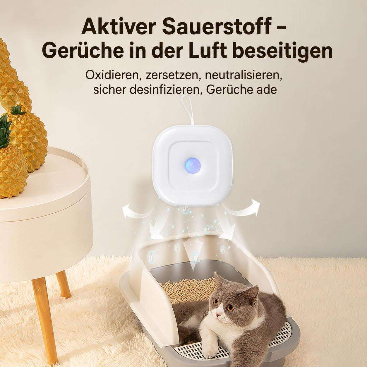Eine Katze ruht in einer Katzentoilette unter einem Frische-Gerät.