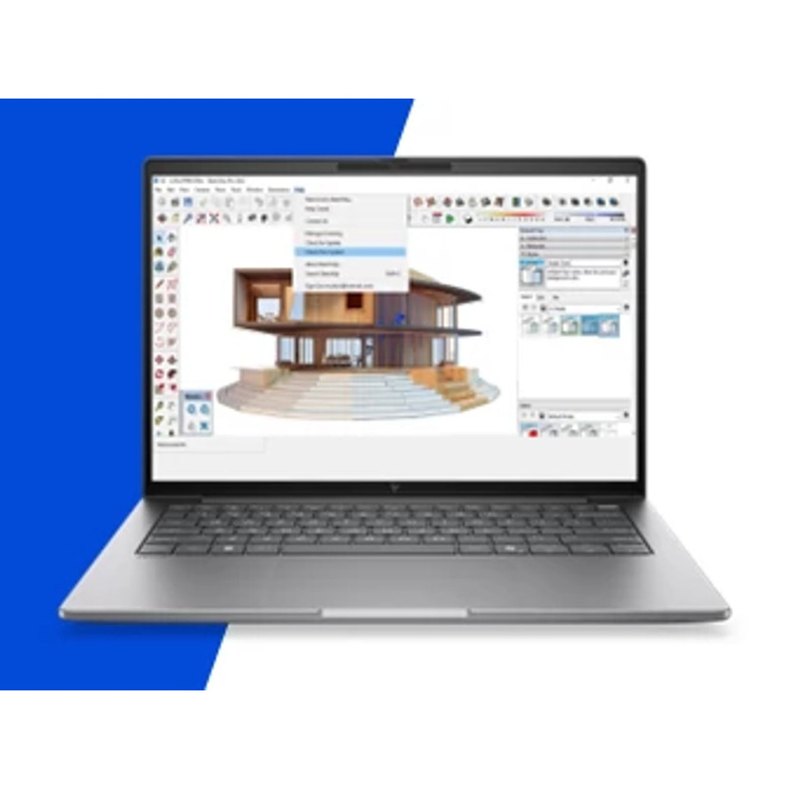 Ein silberner Laptop zeigt ein 3D-Architekturmodell auf dem Bildschirm vor einem blauen Hintergrund.