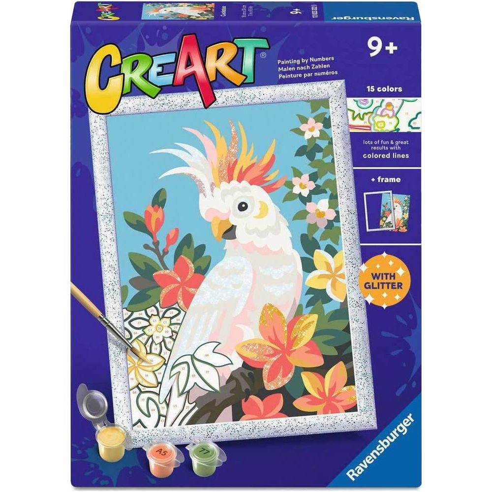 Scatola di pittura con i numeri Ravensburger CreArt con un cacatua bianco e fiori colorati, colori e pennello.