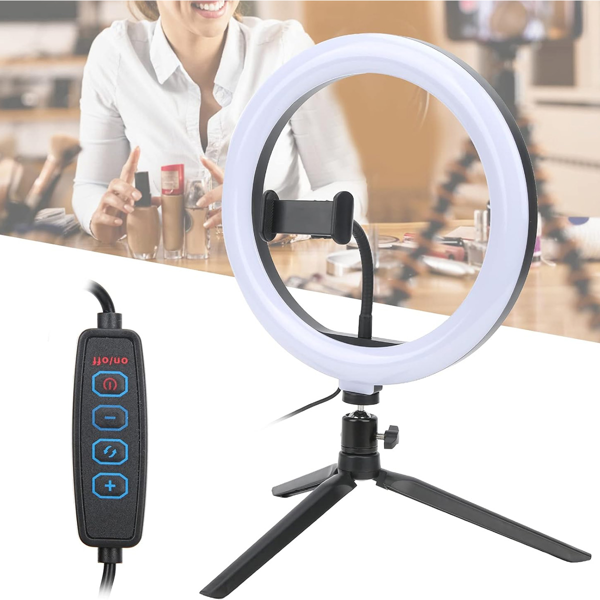 Ein weißer Ringlicht auf einem Stativ mit Smartphone-Halterung und Kabelfernbedienung, im Hintergrund eine Person.