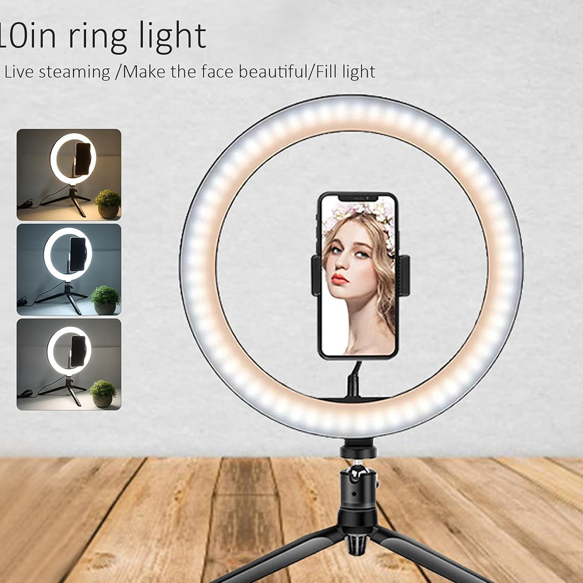 Ein 10-Zoll-Ringlicht auf einem Stativ mit einer Smartphone-Halterung in der Mitte, stehend auf einer Holzoberfläche.