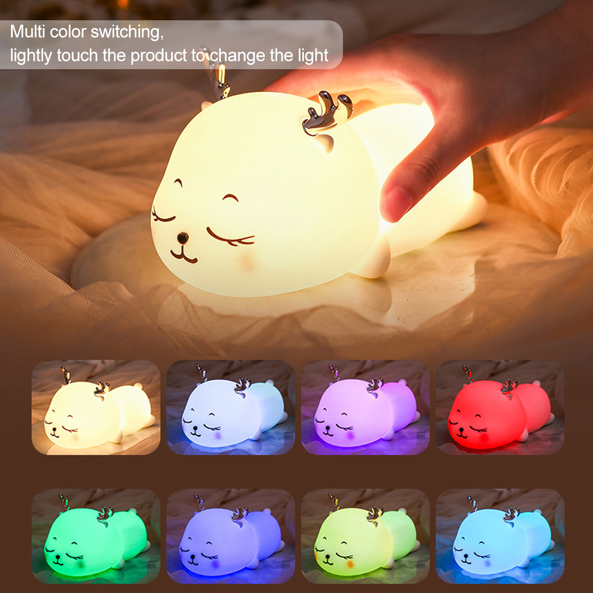 Eine Hand berührt eine niedliche, leuchtende Reh-Nachtlampe, die in verschiedenen Farben leuchtet.