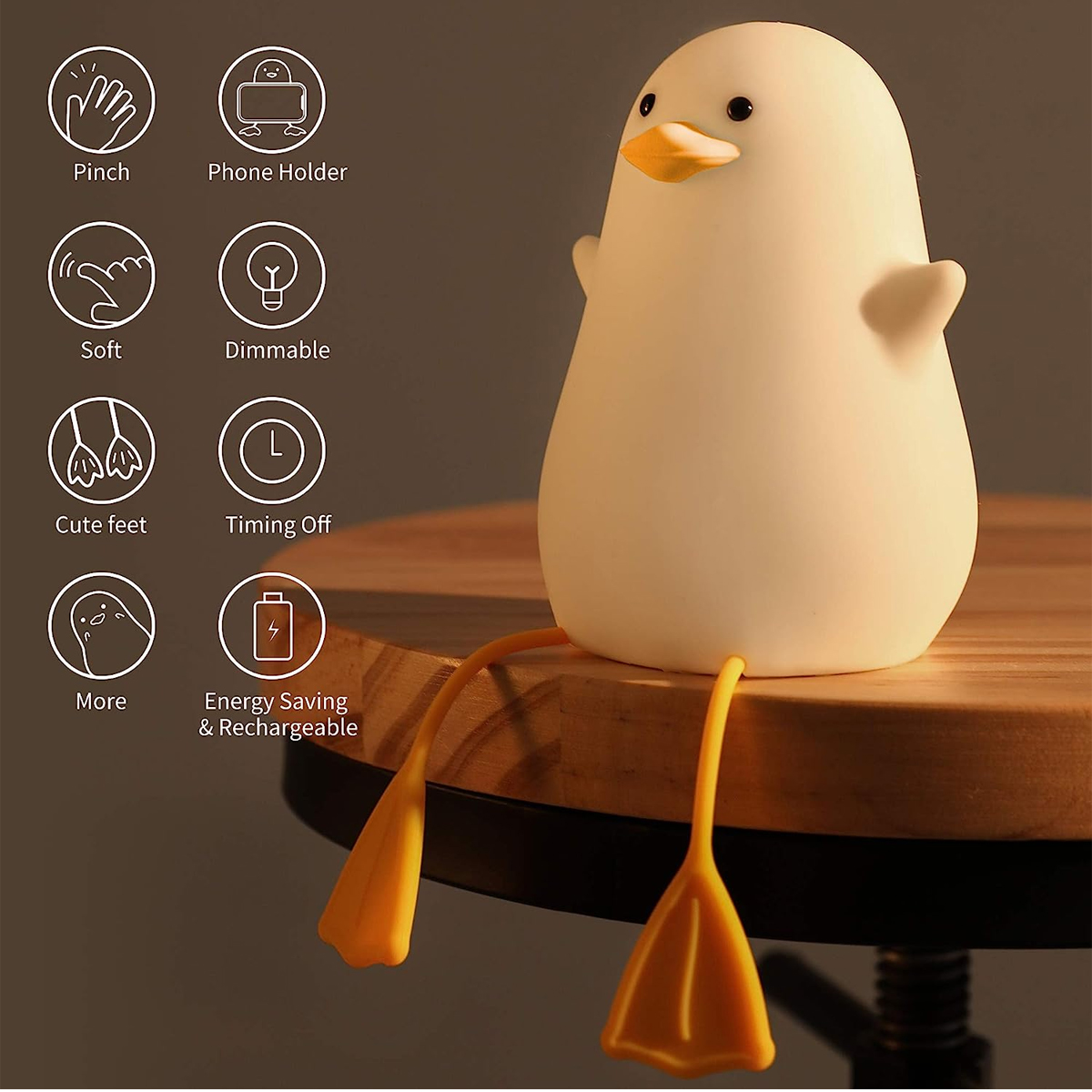 Eine süße Entenlampe sitzt auf einem Holzschemel mit Icons ihrer Funktionen links.