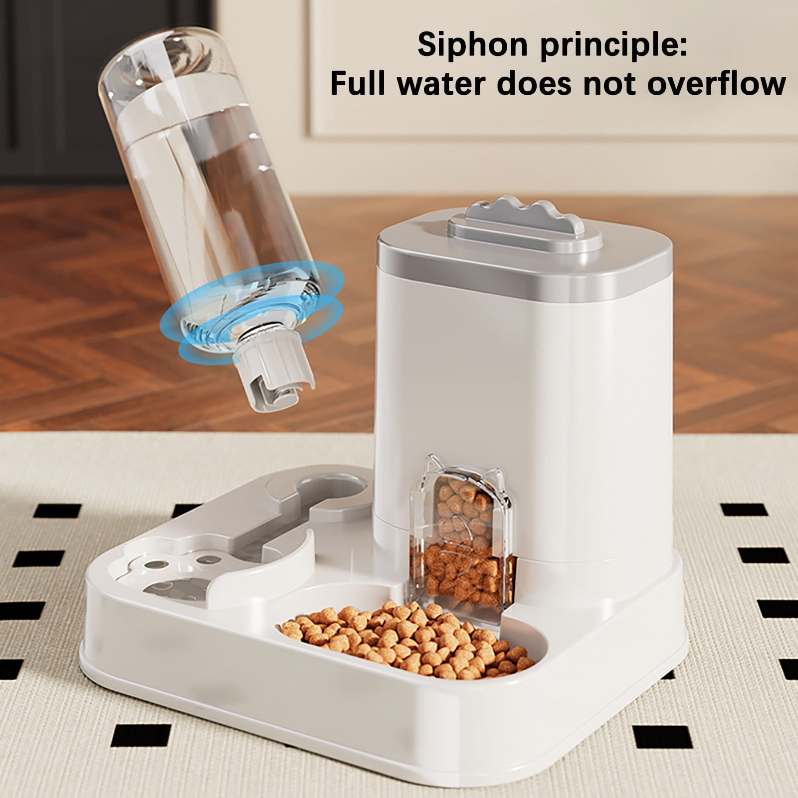 Ein weißer automatischer Futterautomat mit umgedrehter Wasserflasche für das Siphon-Prinzip.