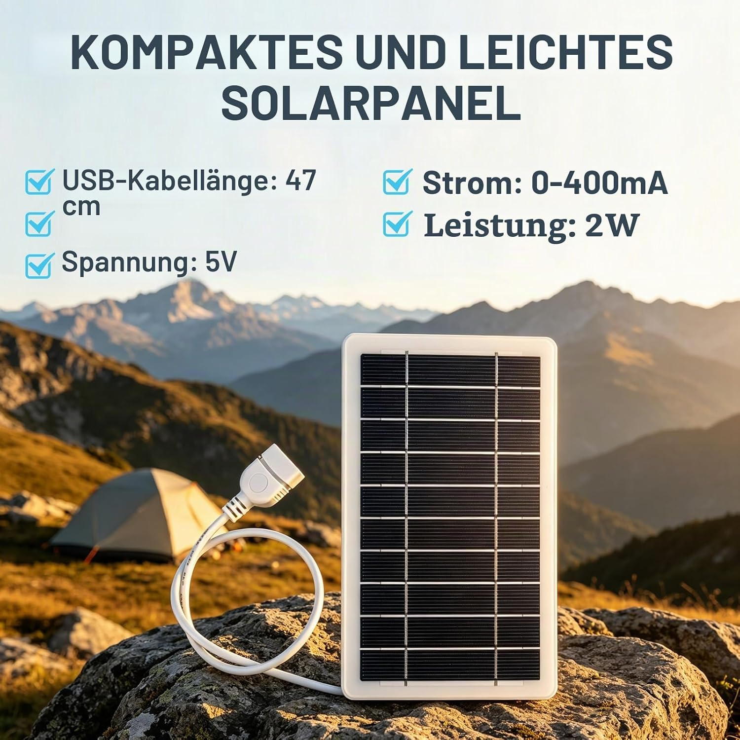Kompaktes Solarpanel auf einem Fels in einer Berglandschaft mit Zelt und technischen Daten.