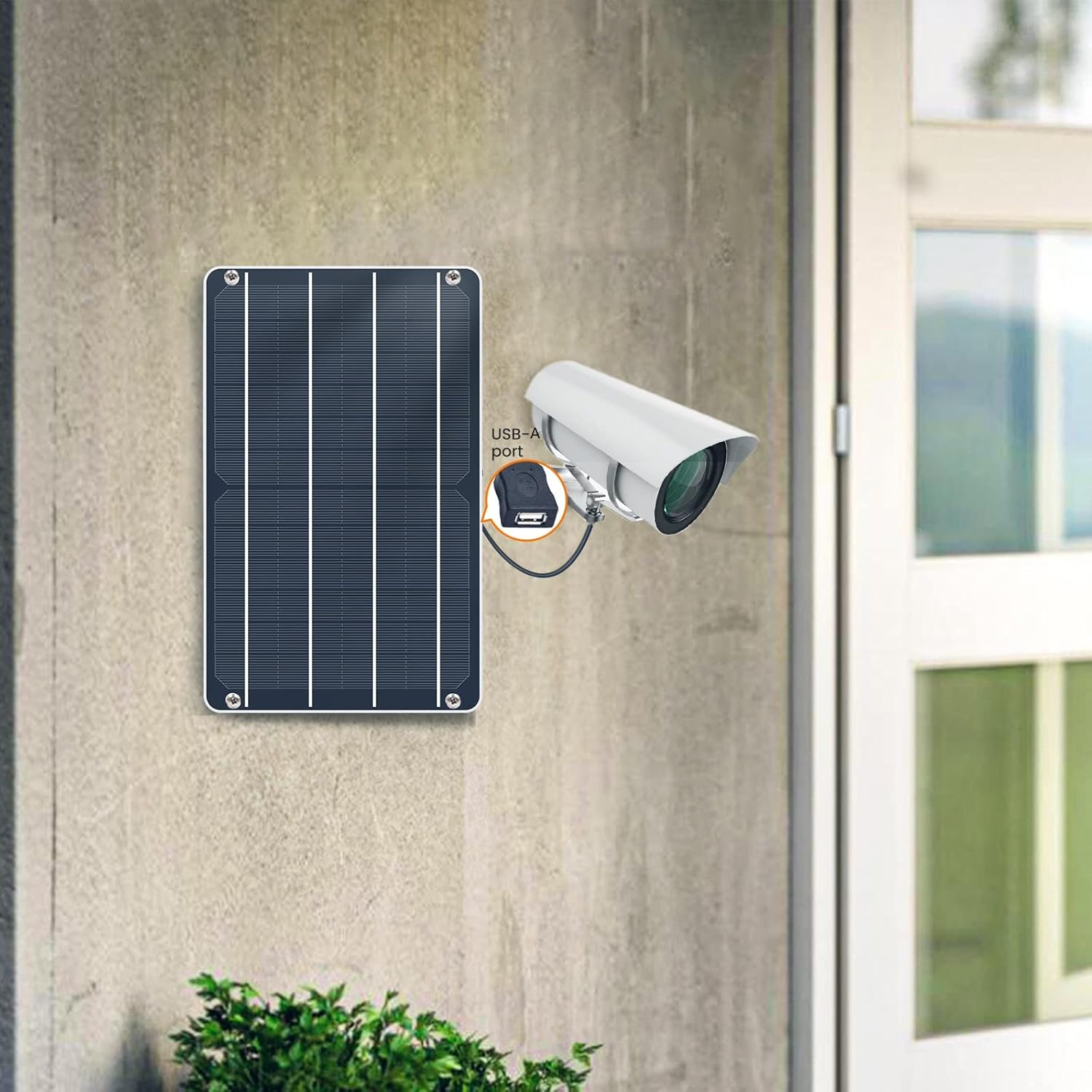 Ein kleines Solarpanel ist mit einer Überwachungskamera an einer Betonwand verbunden.