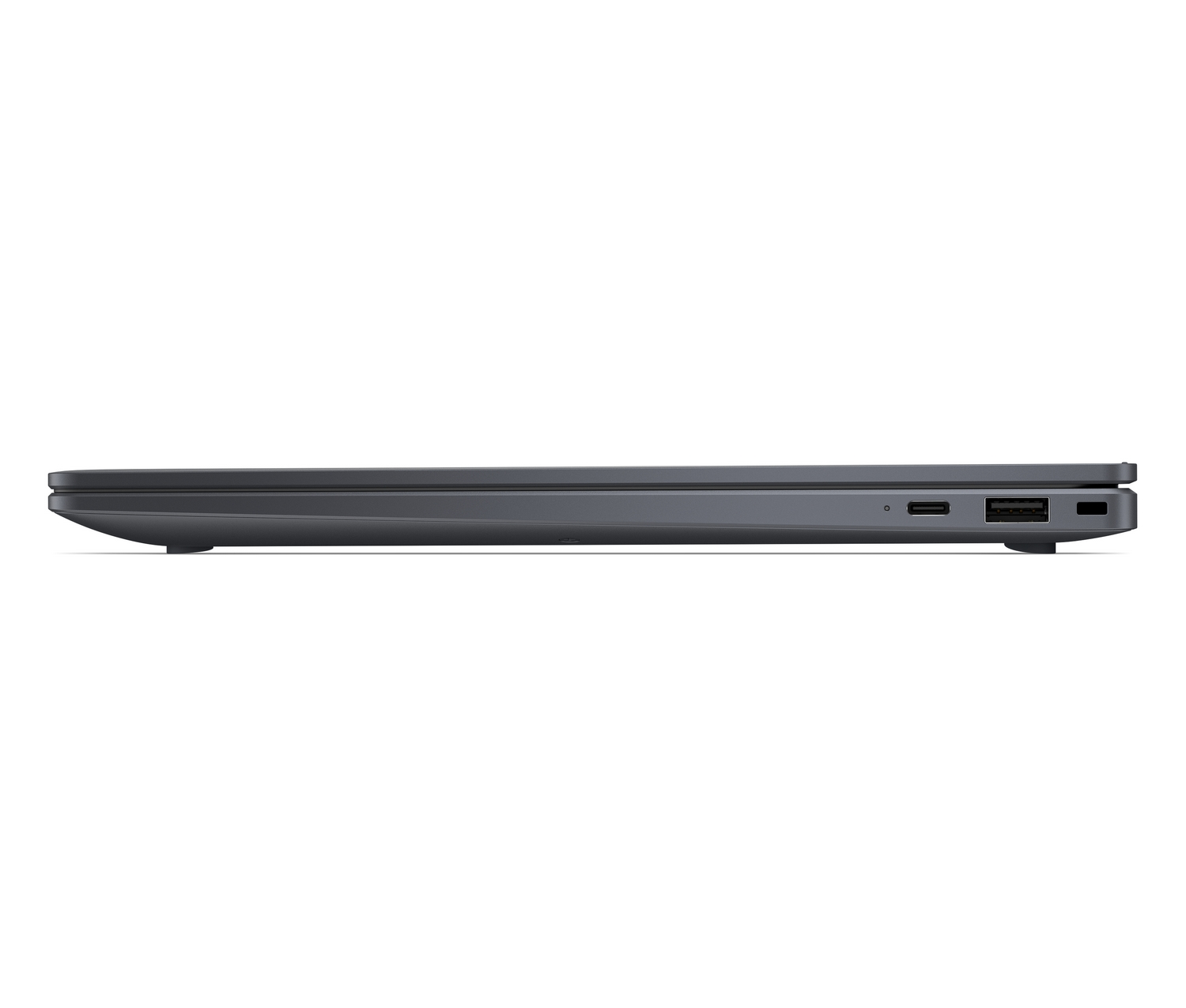 Vista laterale di un laptop scuro chiuso con porte USB e design sottile su sfondo chiaro.