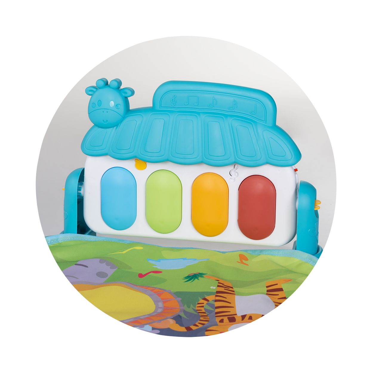 Buntes Babyspielzeug-Klavier mit blauem Dach, Tierkopf und vier großen, farbigen Tasten über einer Spielmatte.