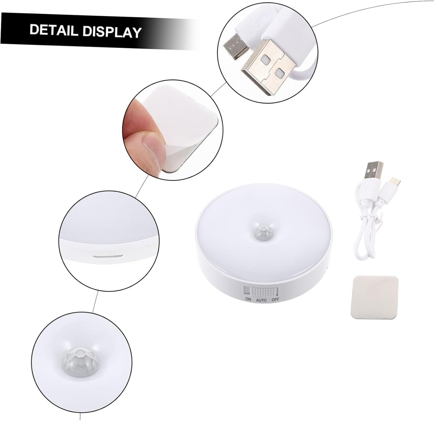 Detailansicht einer weißen LED-Nachtleuchte mit Bewegungssensor, USB-Kabel und Klebe-Pad.