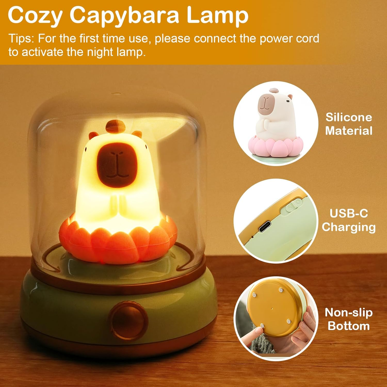 Beige Capybara-Nachtlampe mit orangem Sockel unter einer Glaskuppel, dazu Detailbilder zu Silikon, USB-C und Boden.