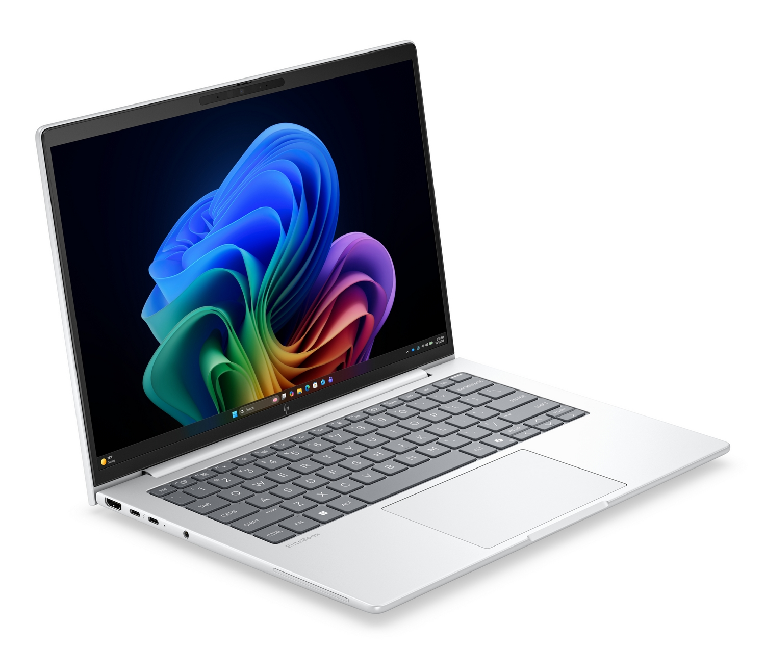 Un laptop argentato con uno sfondo astratto colorato e tastiera grigia, leggermente inclinato su uno sfondo bianco.
