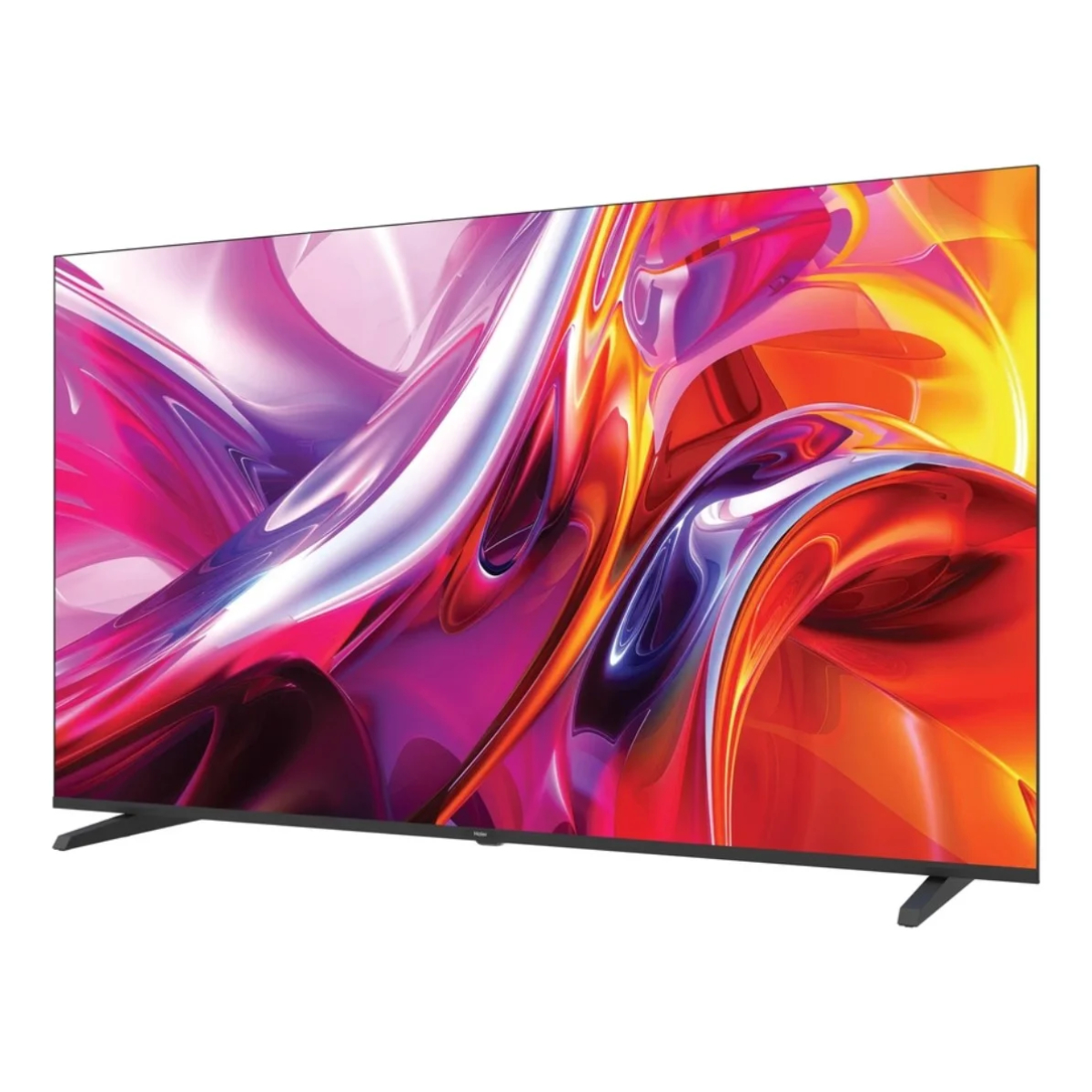 Un televisor delgado con patas muestra un patrón abstracto y colorido en rosa, rojo y amarillo.