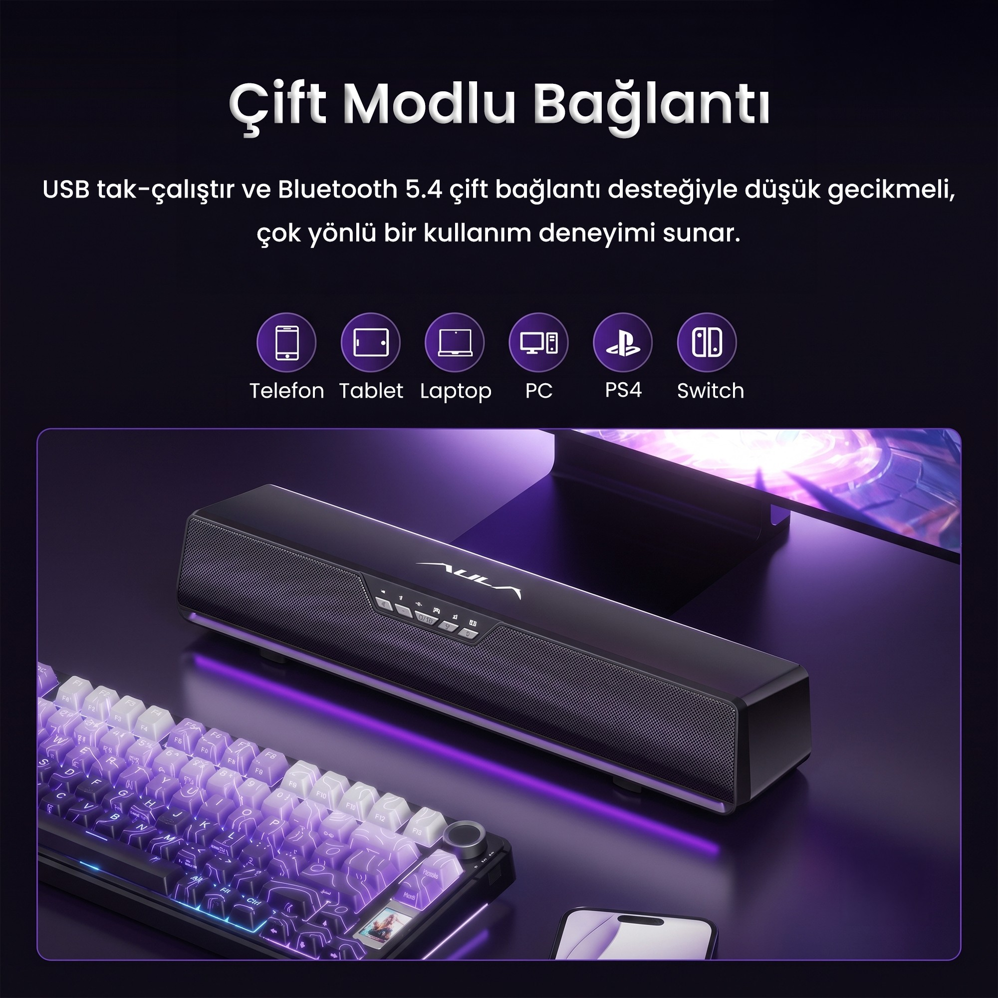 Işıklı bir klavyenin yanında masada duran RGB aydınlatmalı siyah bir soundbar.