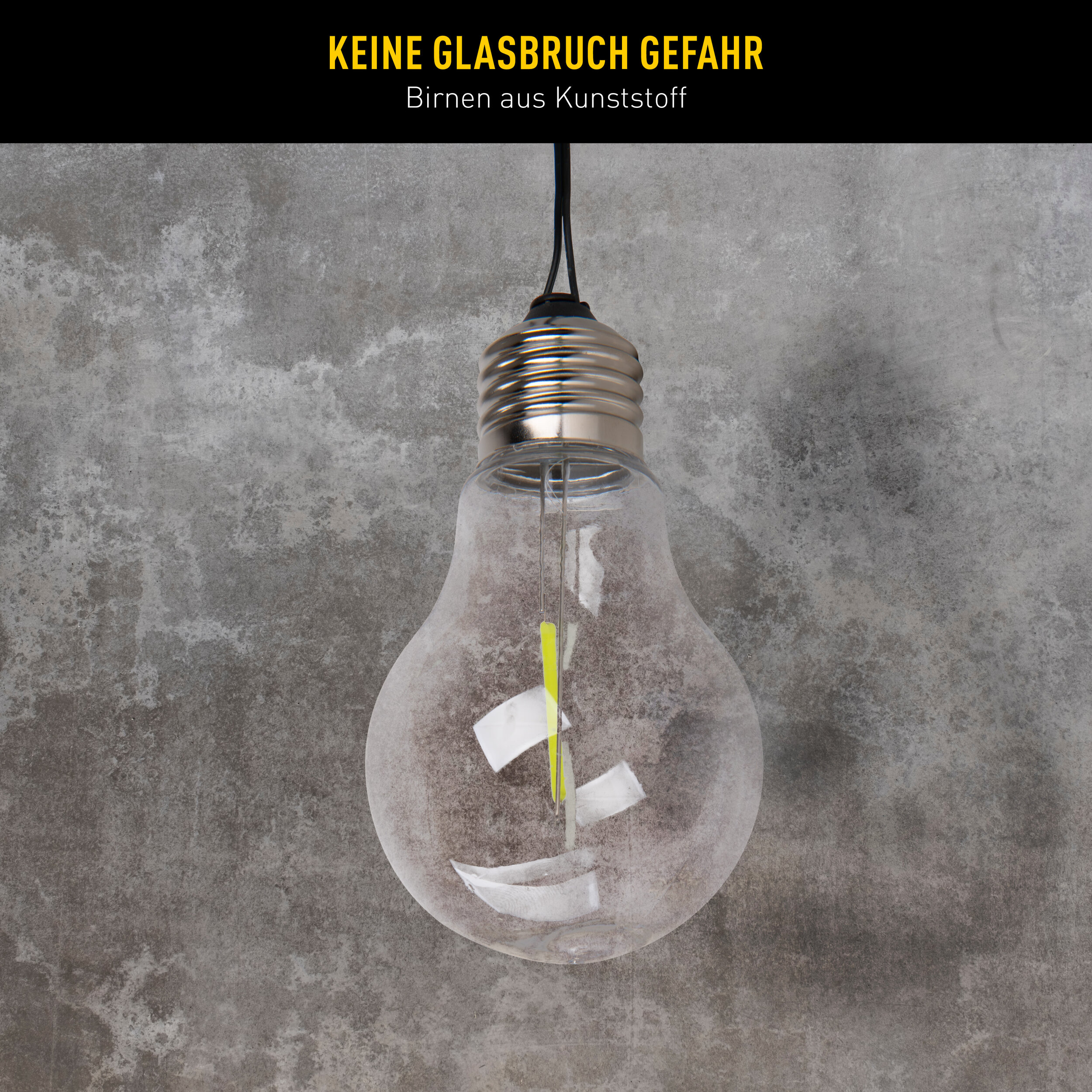 Eine Kunststoffglühbirne hängt an einem Kabel vor einer grauen Betonwand. Oben gelber Text.