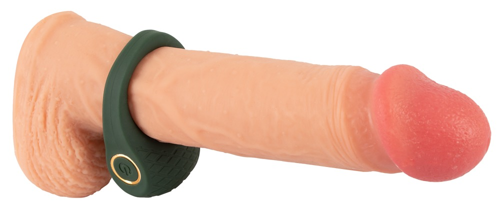 Ein fleischfarbenes Sextoy mit einer dunkelgrünen Silikonhülle und integriertem Ein-Aus-Knopf.