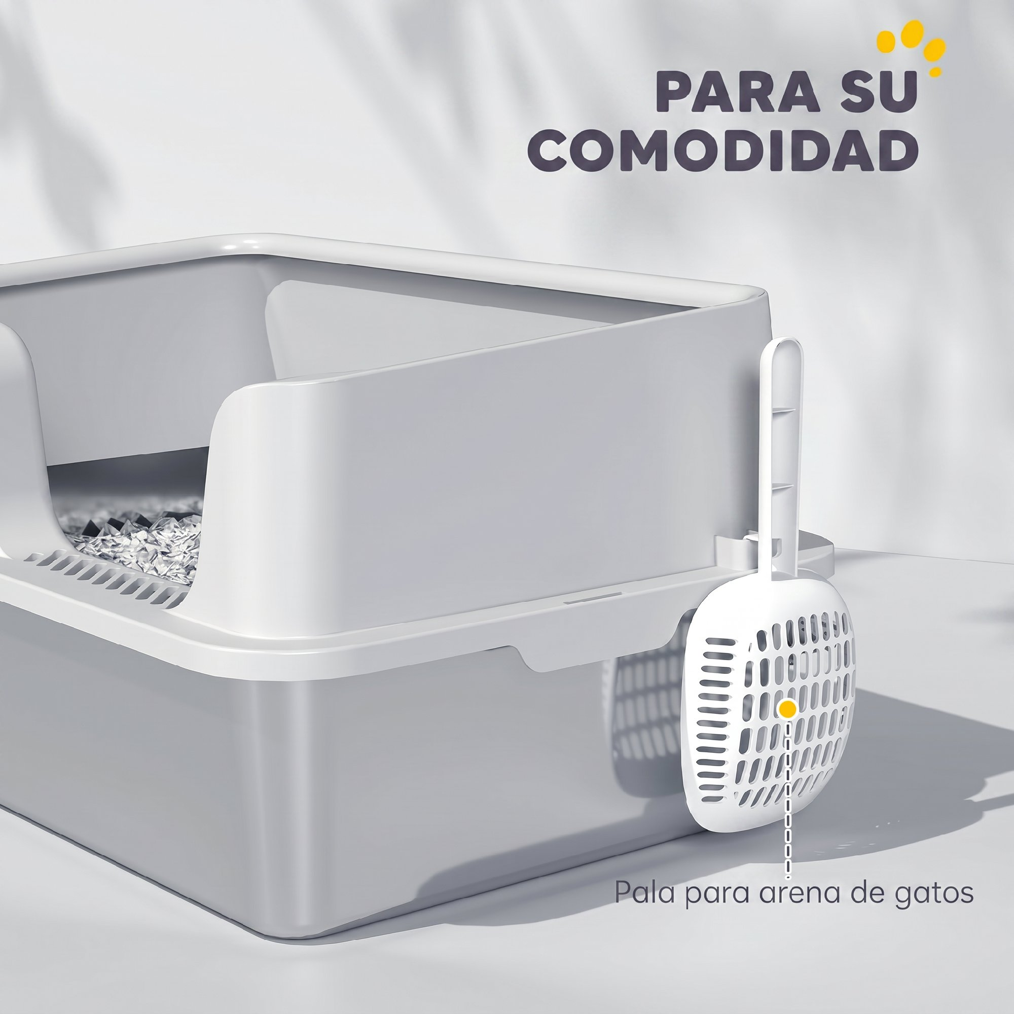 Un arenero para gatos gris claro con una pala blanca a juego colgando en el lateral sobre fondo neutro.