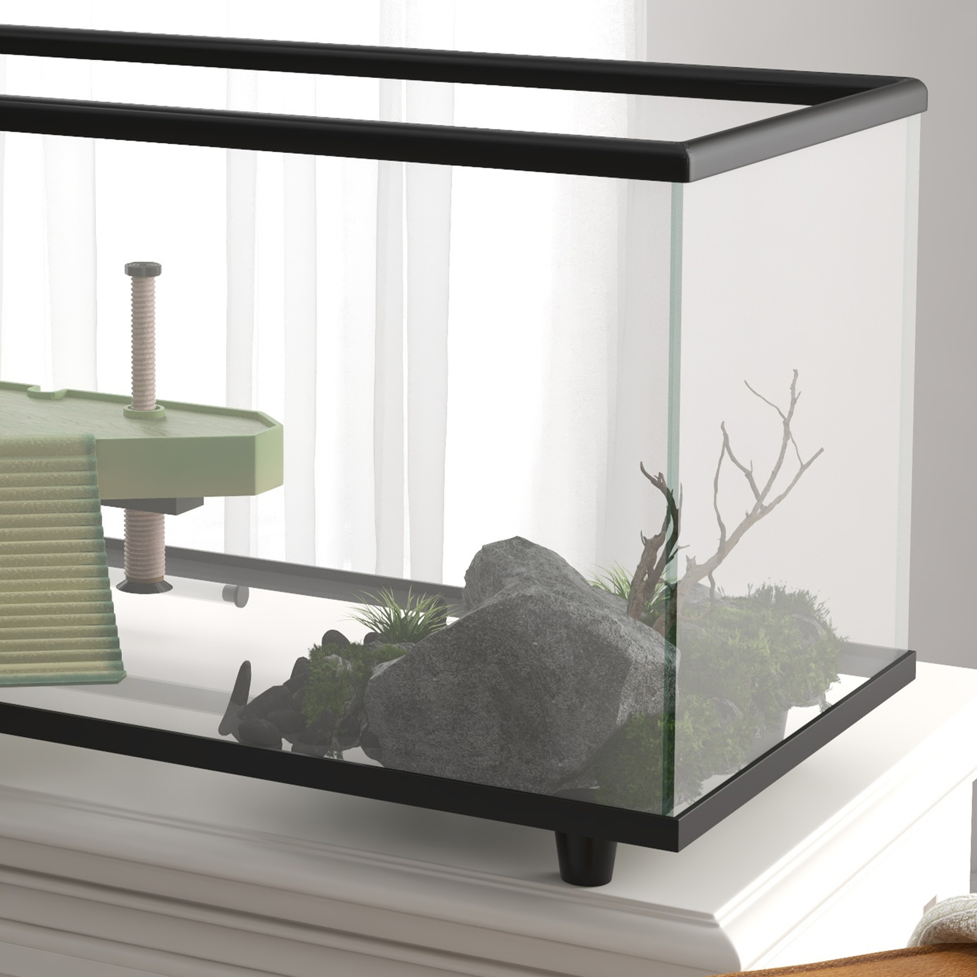 Un terrario de cristal vacío con rocas, musgo y una estructura de escalada de madera para reptiles en una cómoda blanca.