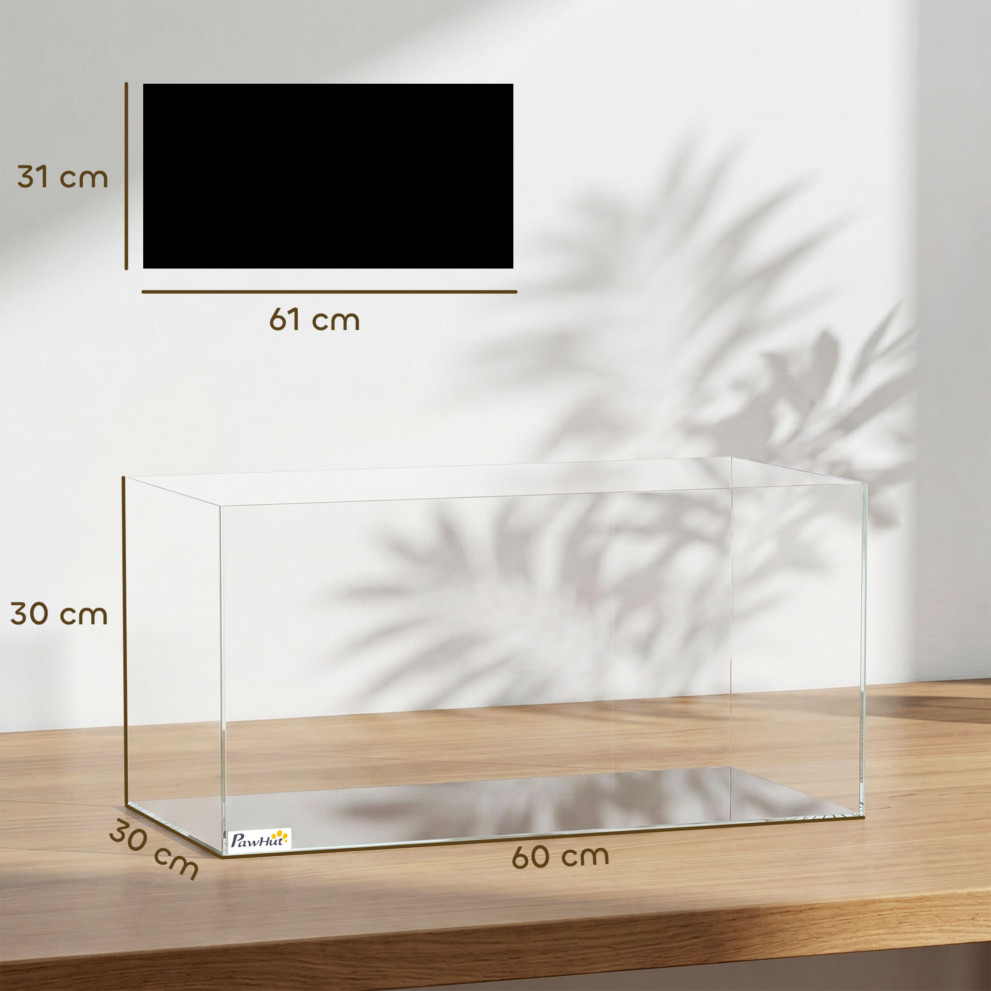 Un terrario de cristal transparente en una mesa de madera con medidas de 60x30x30 cm y un diagrama negro en la pared.