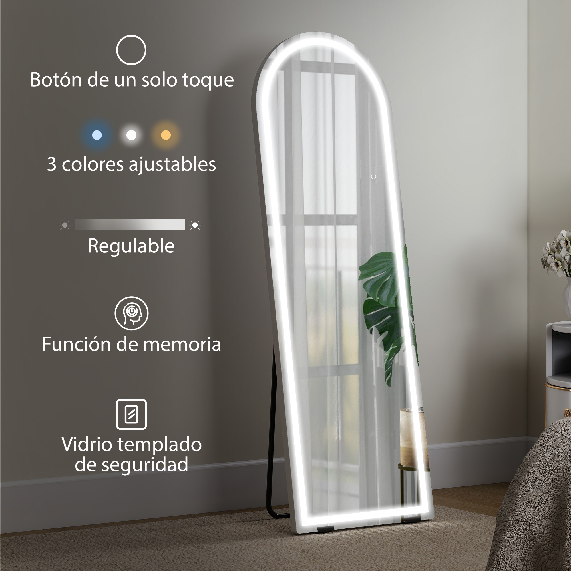 Un espejo de cuerpo entero LED arqueado con control táctil, regulación y memoria, en un dormitorio moderno.