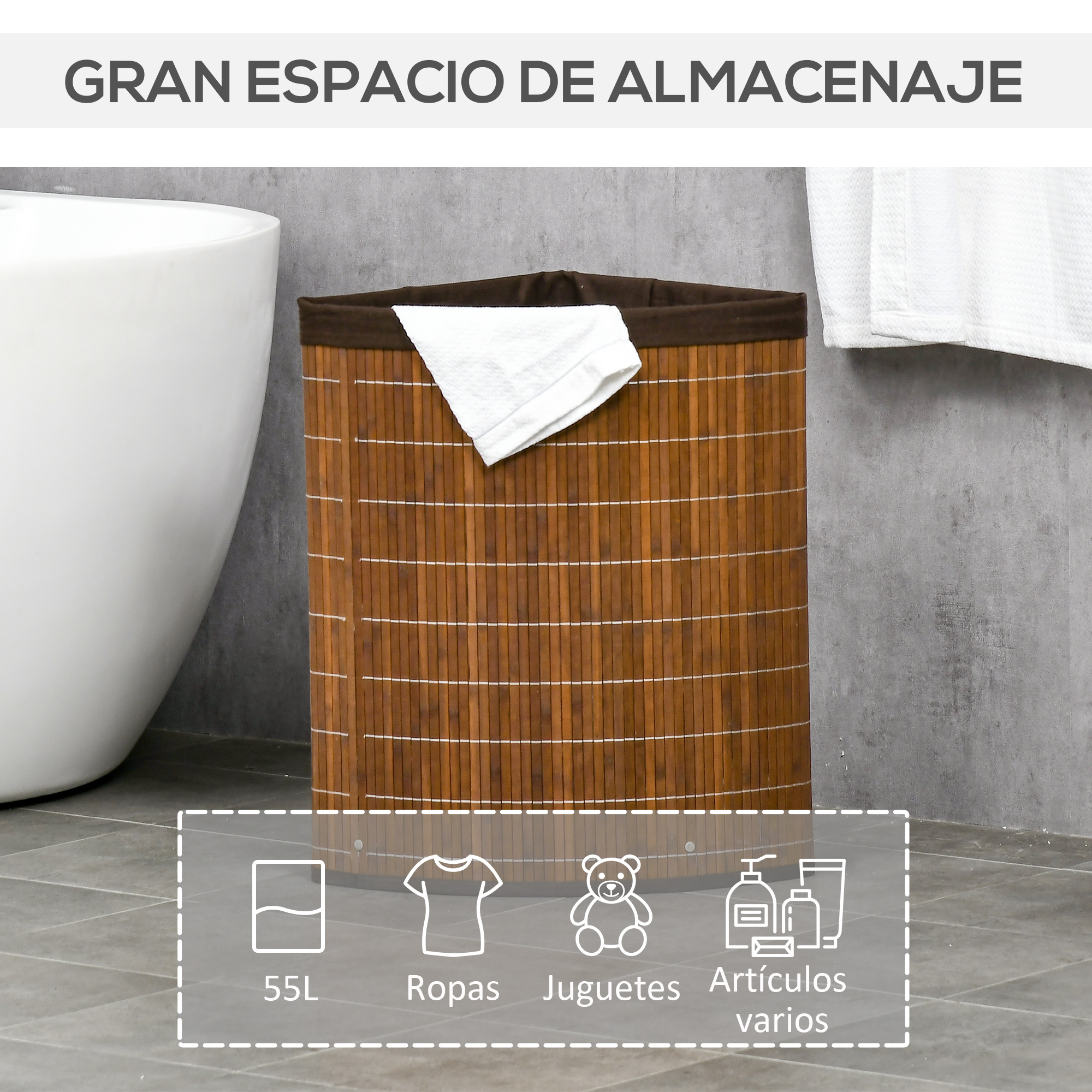 Un cesto de ropa de bambú marrón en un baño, con una toalla blanca en el borde.
