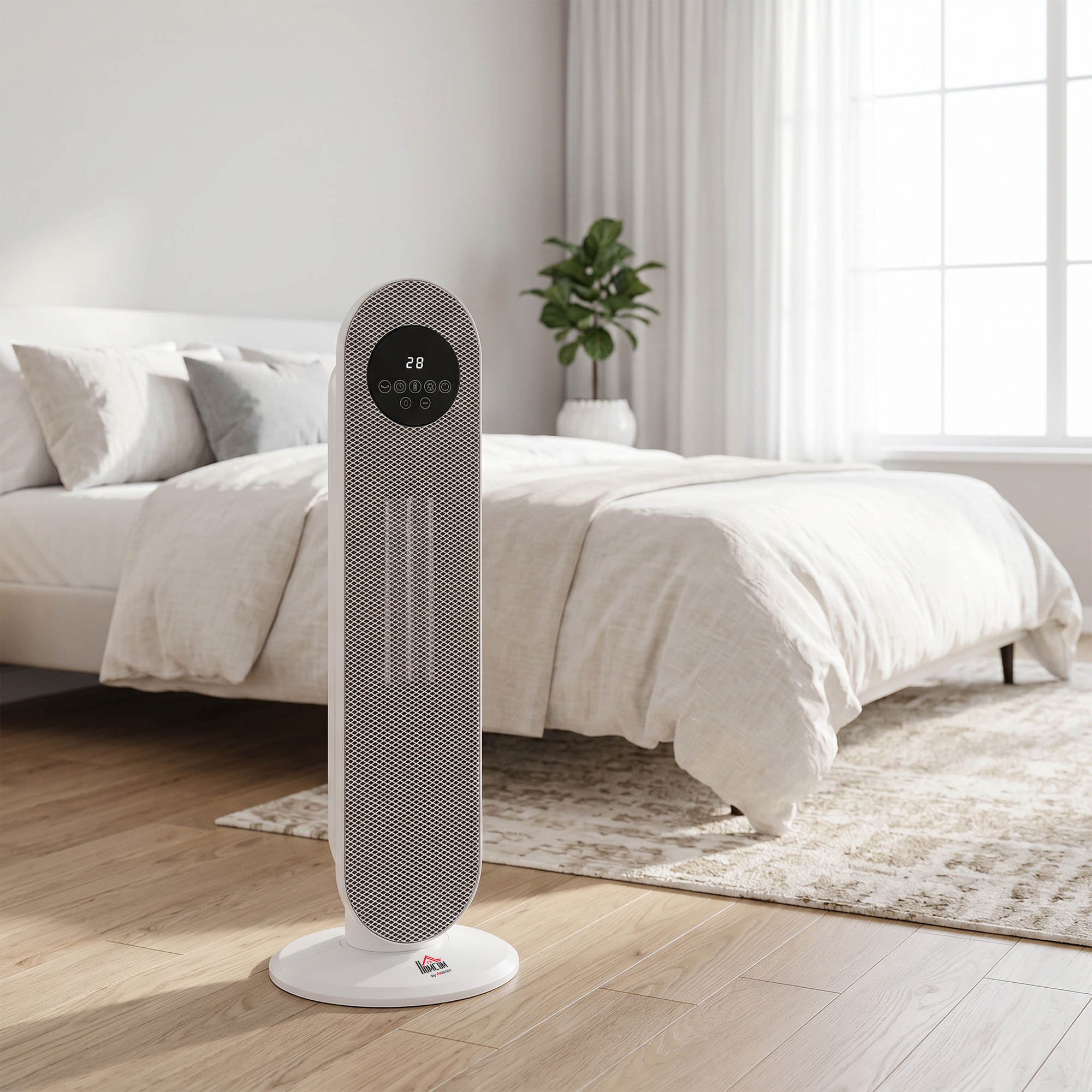 Un ventilador de torre blanco con pantalla digital se encuentra en un dormitorio moderno frente a una cama.
