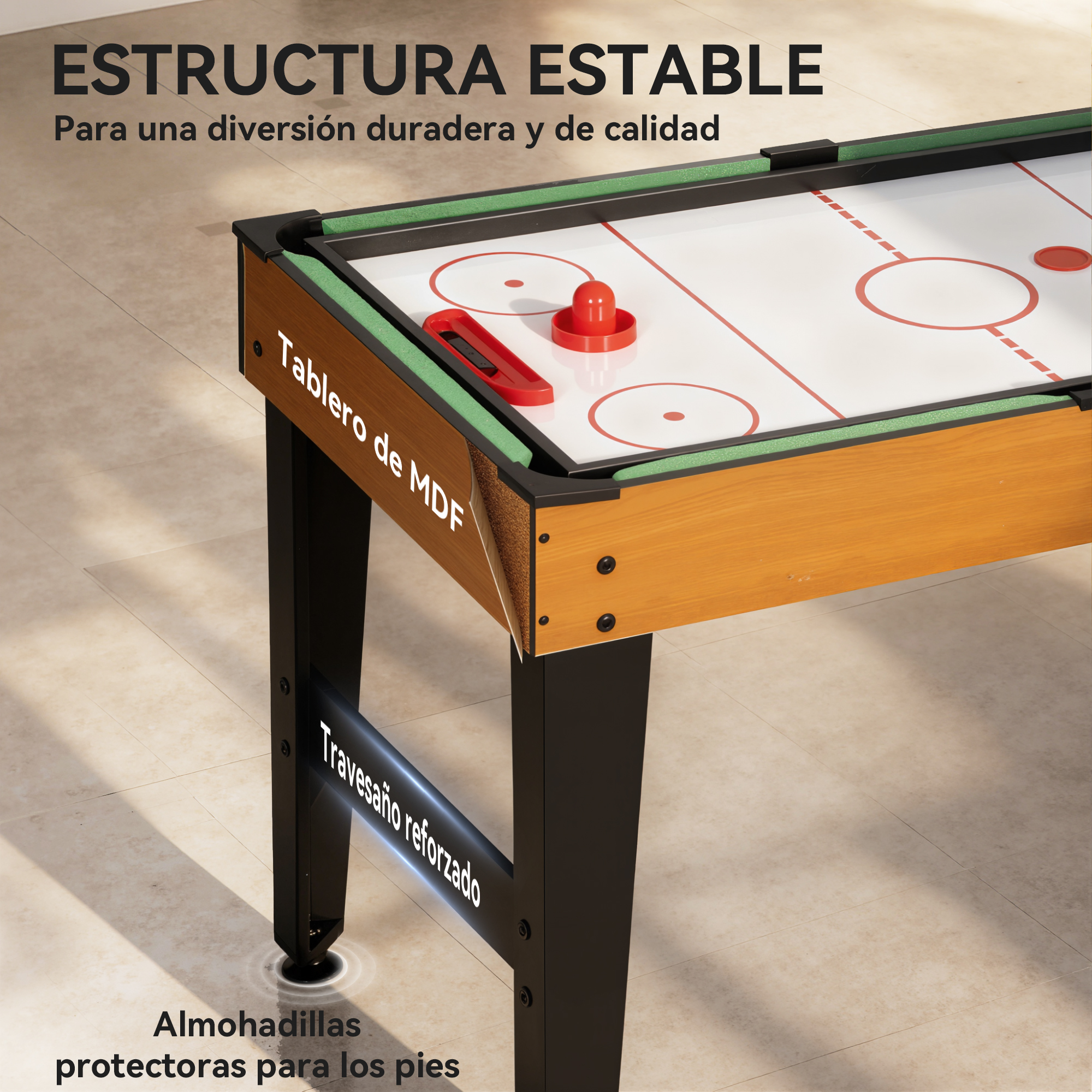 Mesa de air hockey resistente con tablero de MDF, patas reforzadas y golpeadores rojos en suelo claro.