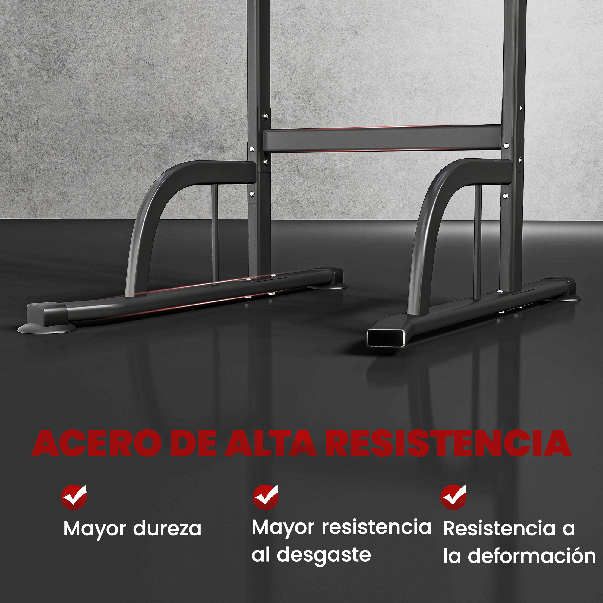 Equipo de gimnasio de acero negro resistente sobre suelo gris con texto en español sobre alta resistencia.