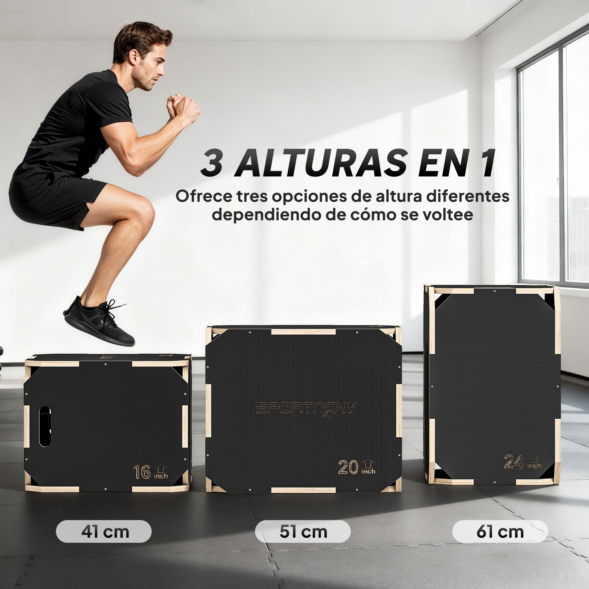 Un hombre salta sobre tres cajas pliométricas negras con alturas de 41cm, 51cm y 61cm en un gimnasio.