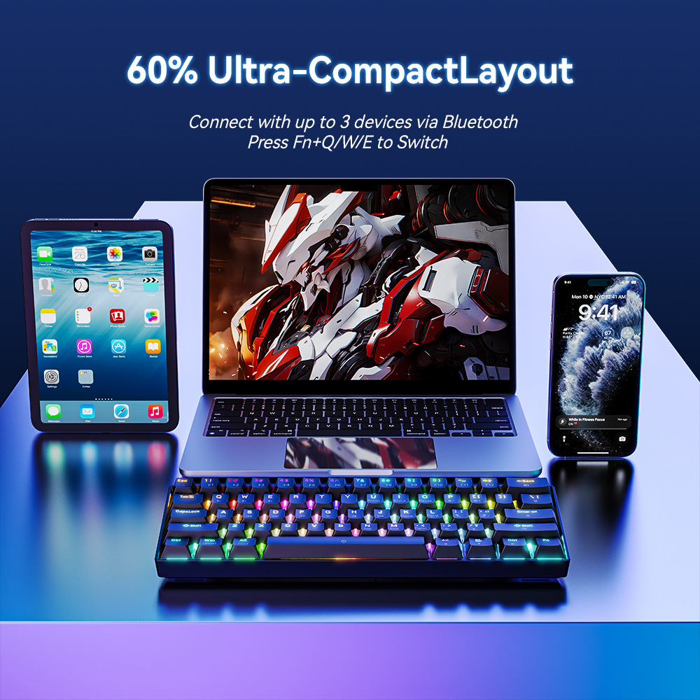 Ein kompakter Laptop, ein Tablet, ein Smartphone und eine bunte RGB-Tastatur auf blauem Hintergrund.