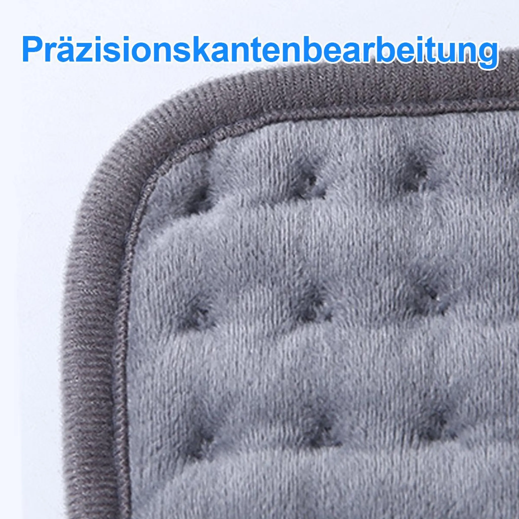 Nahaufnahme einer grauen Heizkissenkante mit präziser Naht.