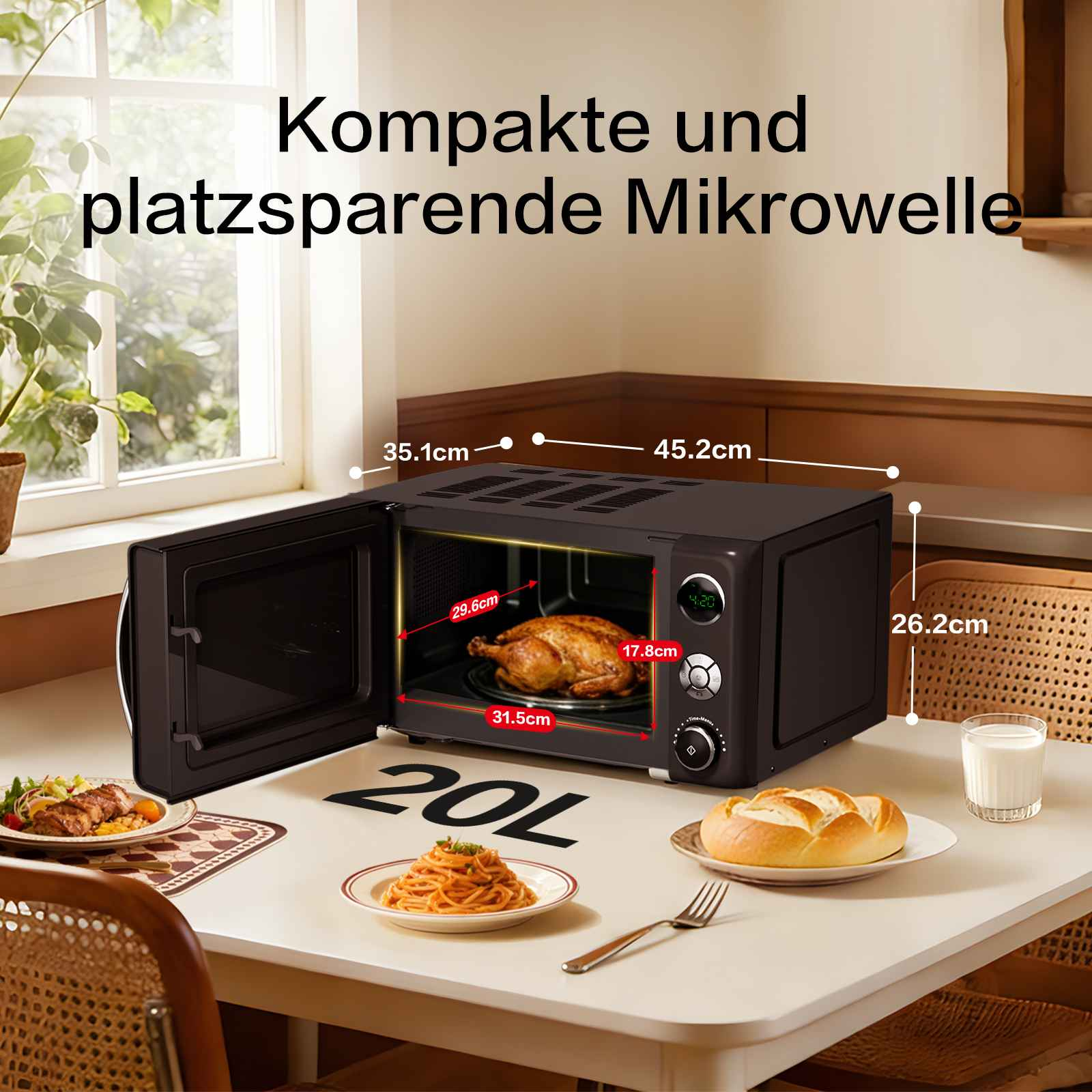 Kompakte schwarze Mikrowelle auf einem Tisch mit Lebensmitteln und Maßangaben.