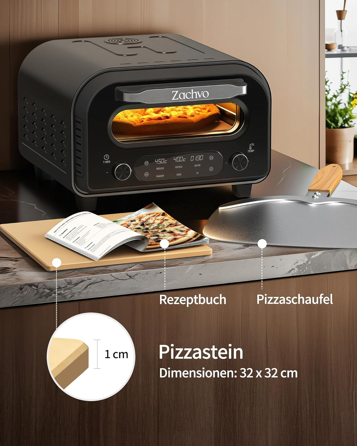 Ein schwarzer Pizzaofen auf einer Theke mit einem Rezeptbuch, einer Pizzaschaufel und einem Pizzastein.