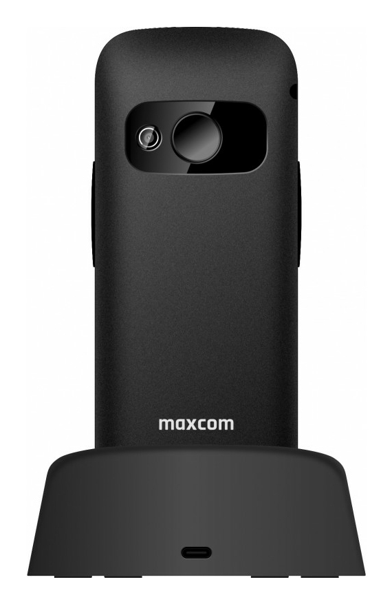 Czarny telefon komórkowy Maxcom umieszczony w czarnej stacji ładującej.