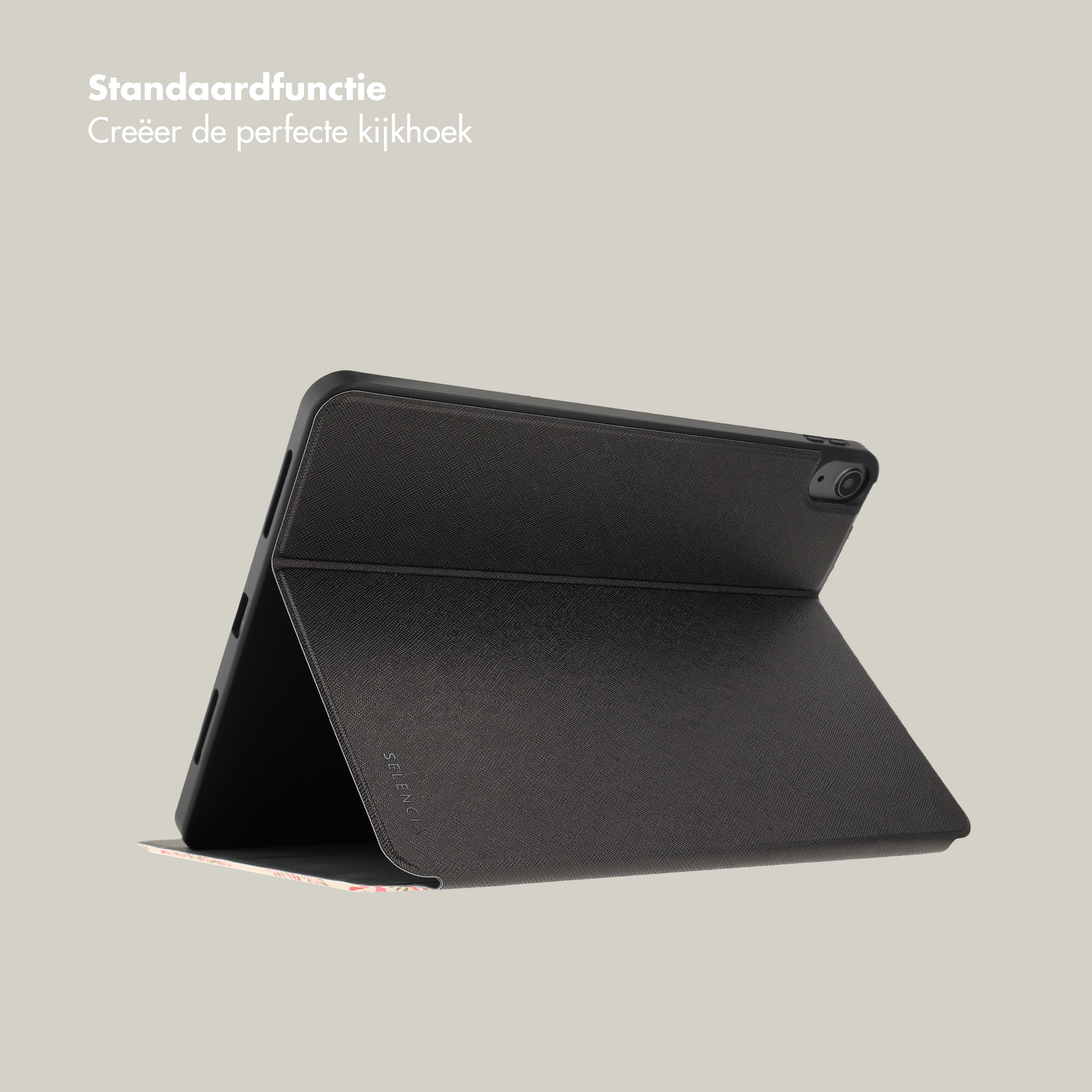 Een zwarte tablet in een hoes met bloemenprint tegen een lichte achtergrond.