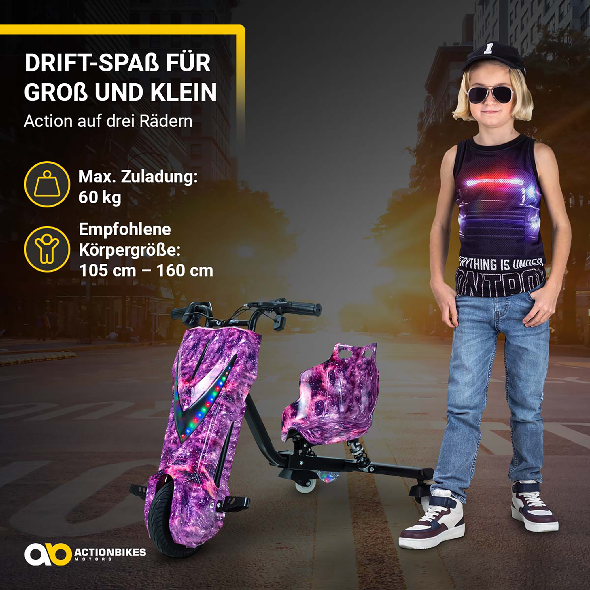 Ein Kind mit Sonnenbrille steht neben einem pinken Galaxie-Drifttrike auf der Straße mit Textoverlays.