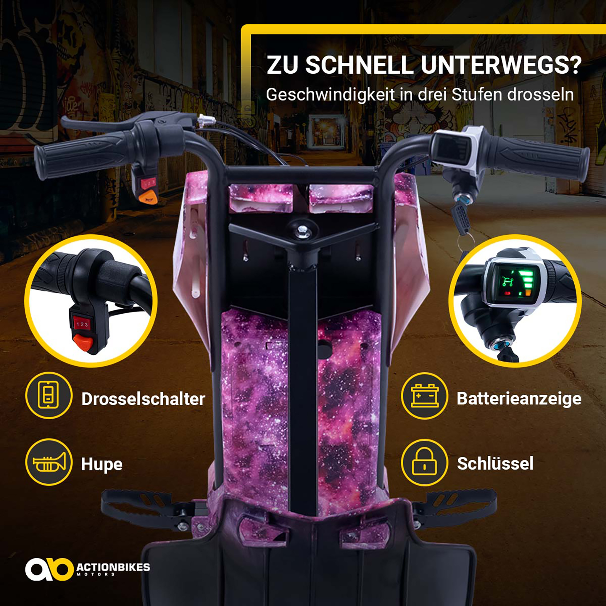 Go-Kart Lenker mit Galaxie-Print, Drehzahlregler, Batterieanzeige, Hupe und Schlüssel in einer urbanen Gasse.