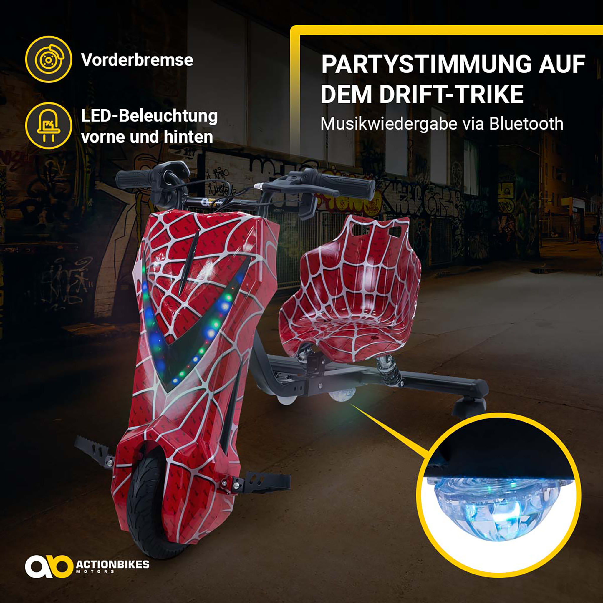 Rot-schwarzes Drift-Trike im Spinnennetz-Design mit LED-Beleuchtung und Bluetooth.