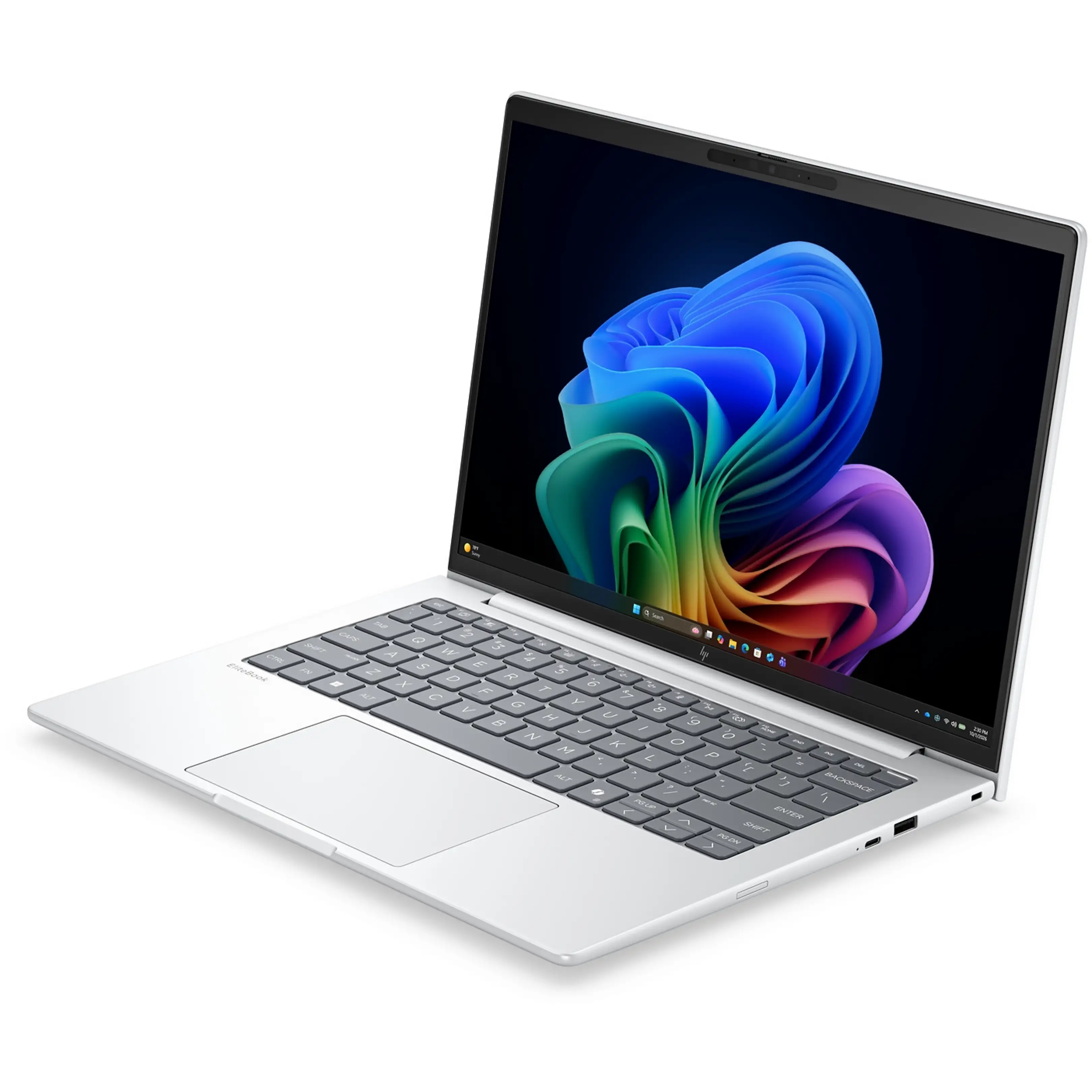 Un computer portatile argentato su sfondo bianco mostra un vortice floreale astratto e colorato sullo schermo.