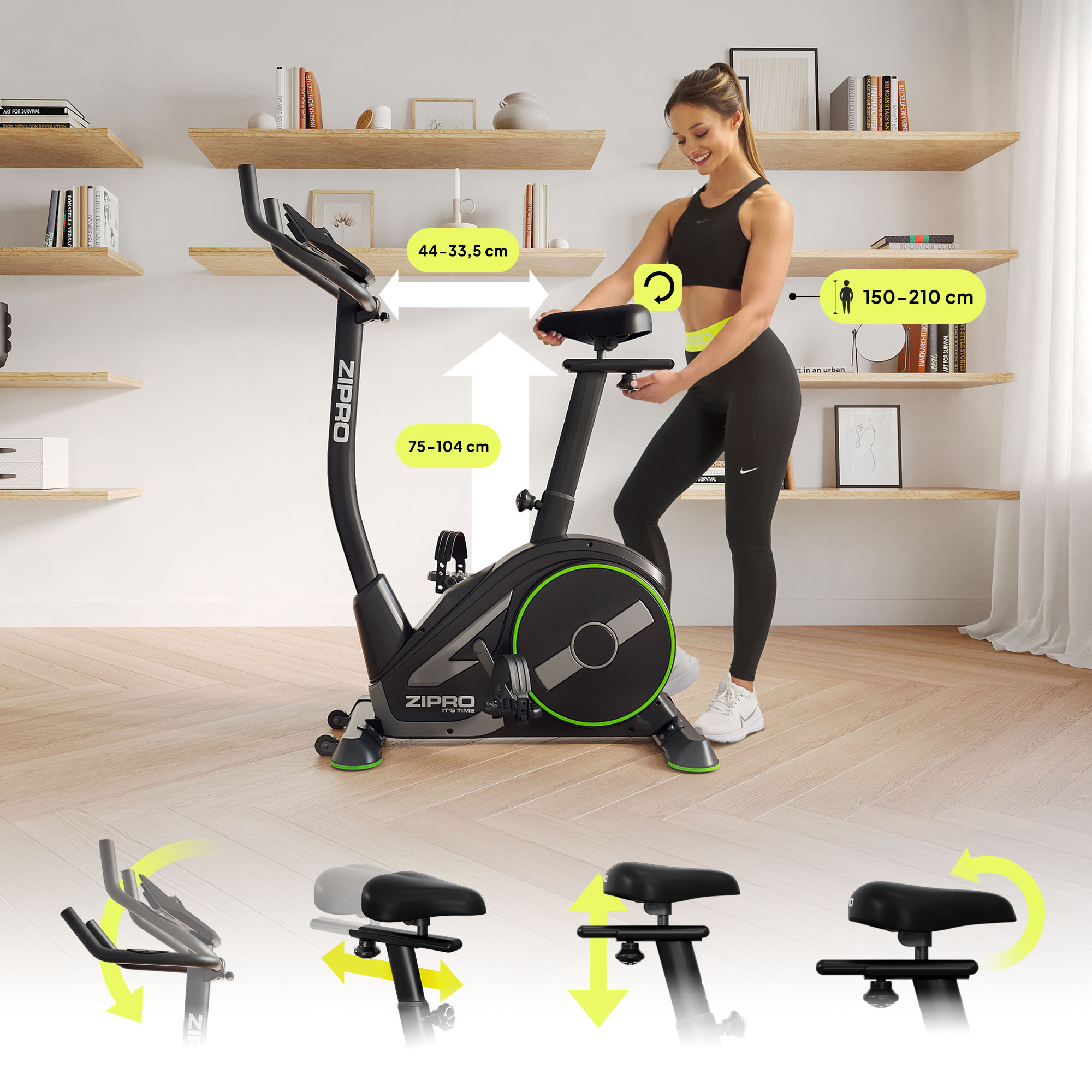 Una donna regola una cyclette nera e verde in una stanza con scaffali.