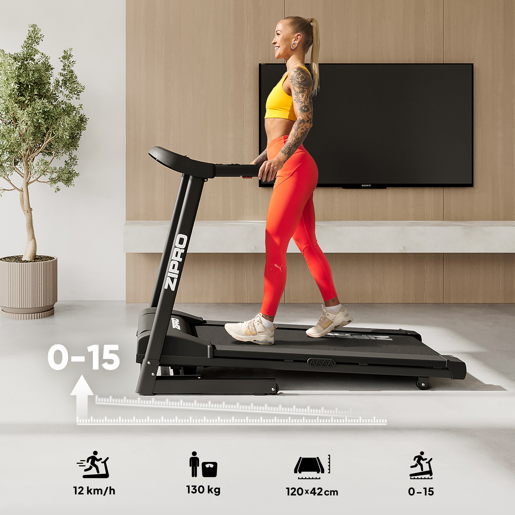 Donna in abbigliamento sportivo cammina su un tapis roulant Zipro in una stanza moderna.