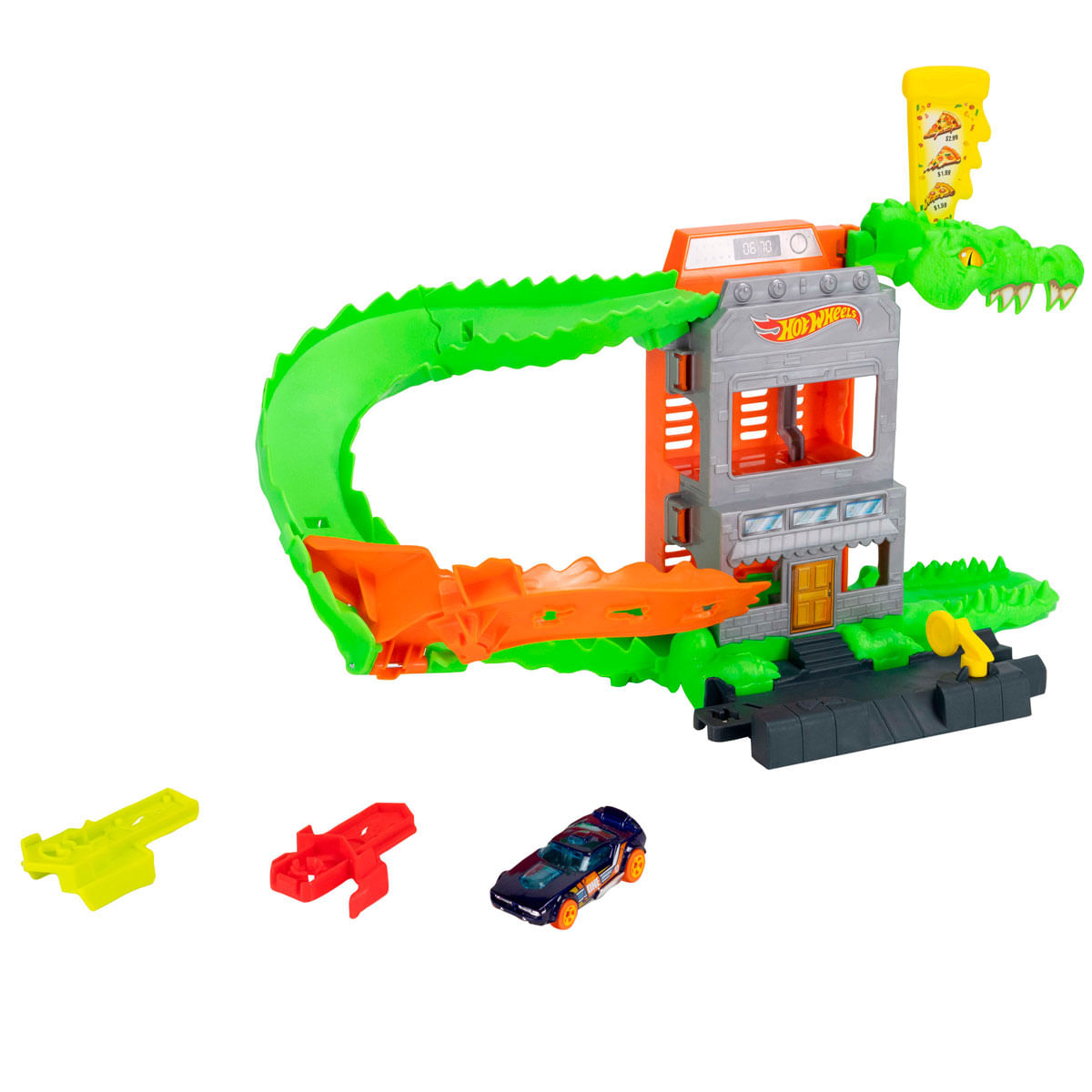 Conjunto de juego Hot Wheels con tema de caimán, pista, edificio, auto de juguete y dos accesorios sobre fondo blanco.