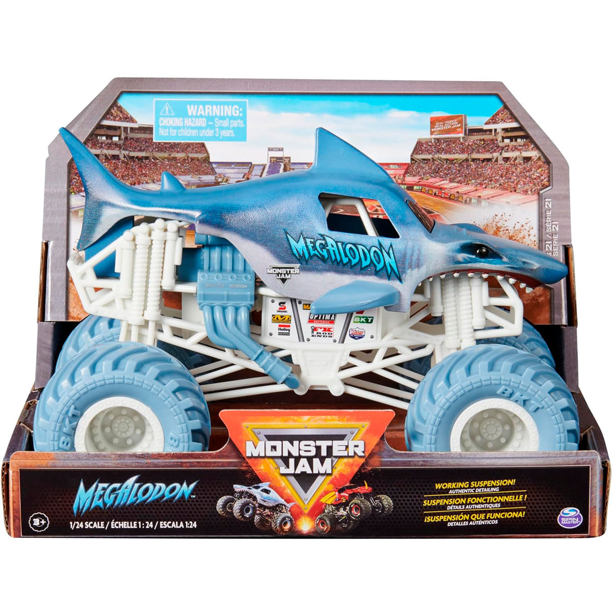 Camión monstruo de juguete Megalodon de Monster Jam en caja azul y blanca con fondo de estadio.