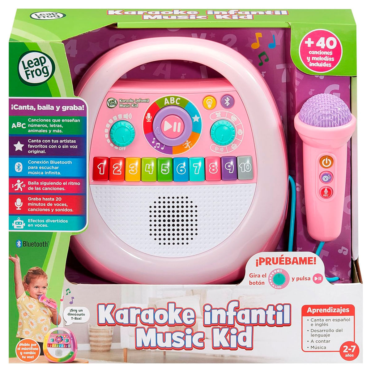 Máquina de karaoke infantil LeapFrog rosa con botones coloridos y un micrófono en caja verde.