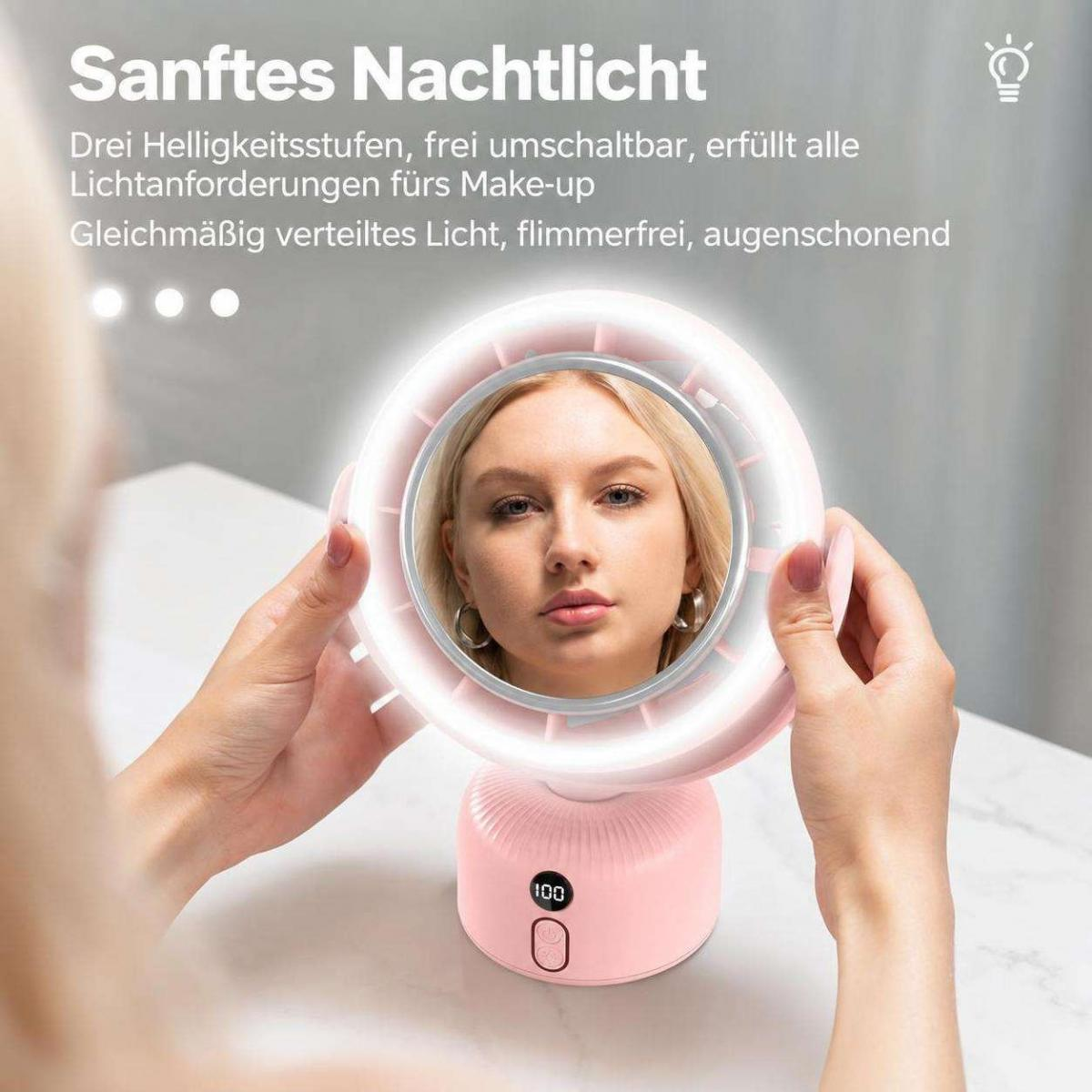 Eine Frau hält einen runden, rosa beleuchteten Make-up-Spiegel mit digitaler Anzeige in Händen.